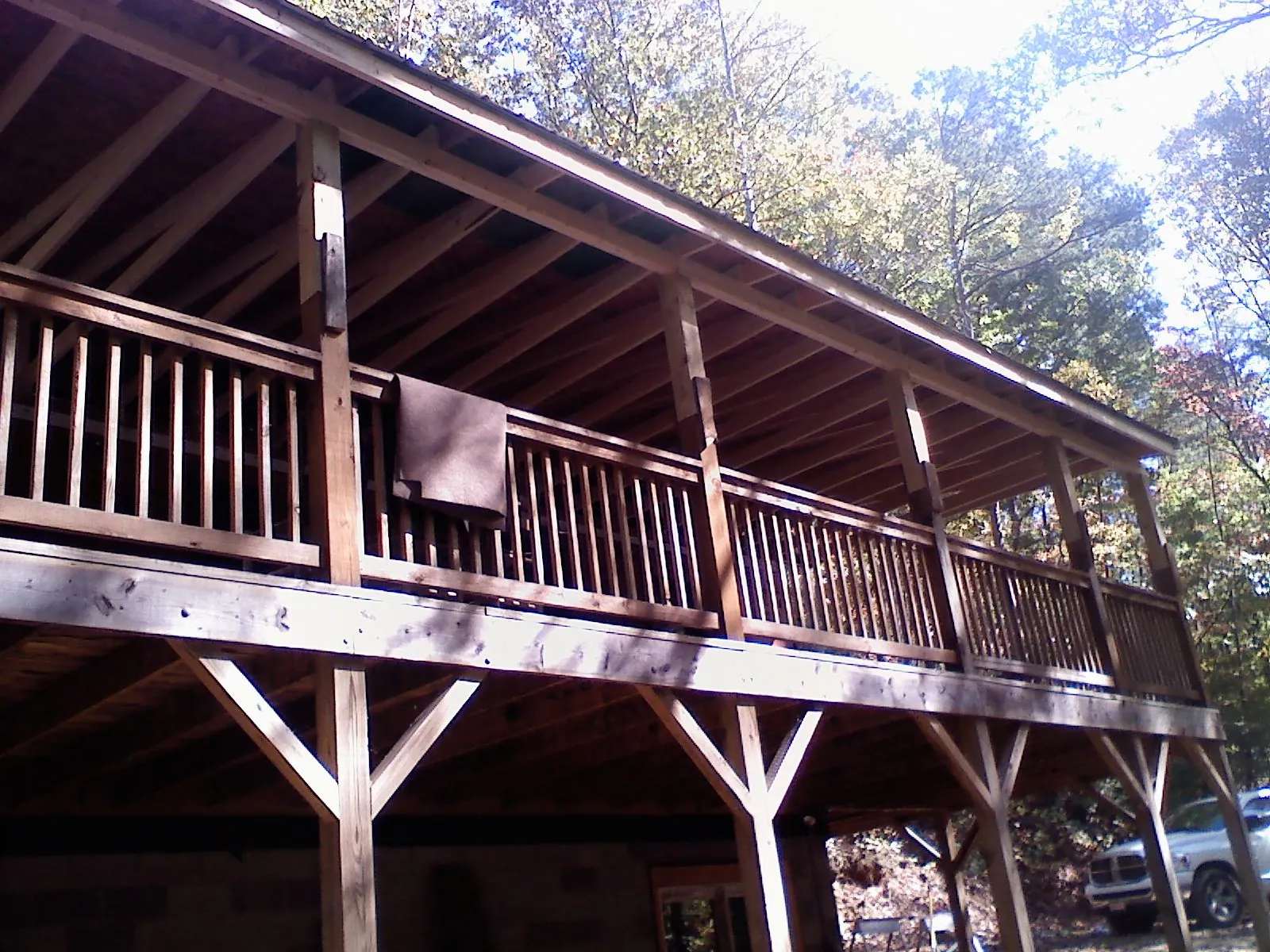 Timber framing under a new elevated porch and deck — Roof Leak Repair in Wilsall by Roofing Brothers